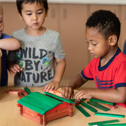 boys building a play house