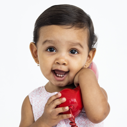 little girl holding play phone