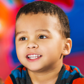 young boy smiling